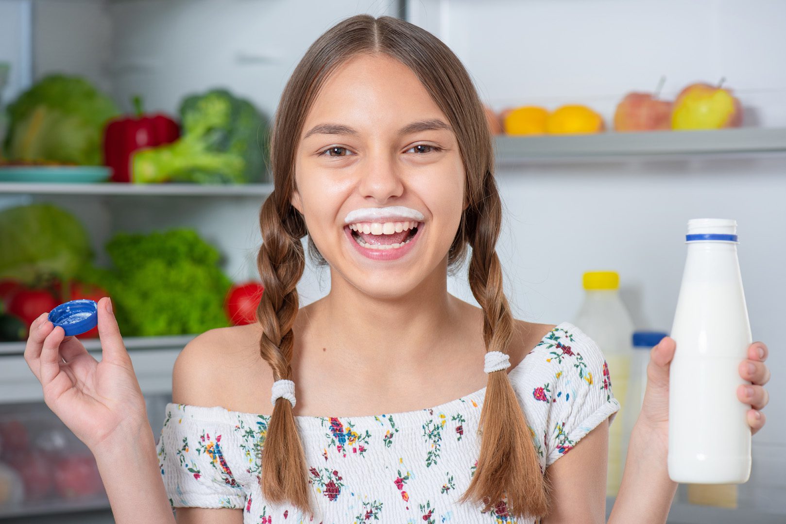 Girl With Food Near Fridge